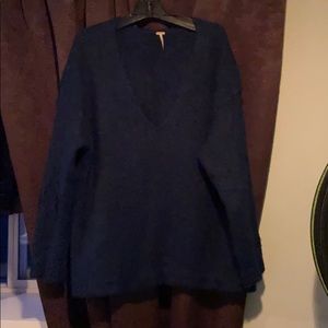 Sweater- turquoise in color